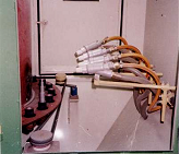 Eight-station indexing turntable blast system arrangement