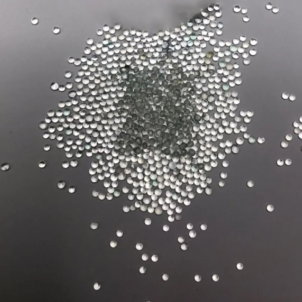 Close view of round transparent glass blasting beads